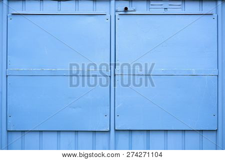 Blue Metal Shutters On A House In Germany