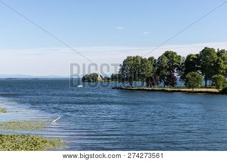 South Lancaster, Ontario - July 22, 2018 - Horizontal Landscape Of A Motor Boat Crusing In A Small I