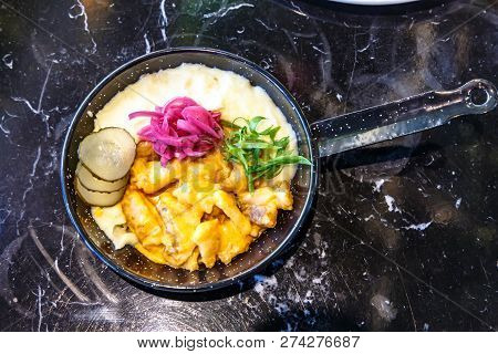 Skoblyanka On Stroganovski From Fish With Potatoes On A Frying Pan