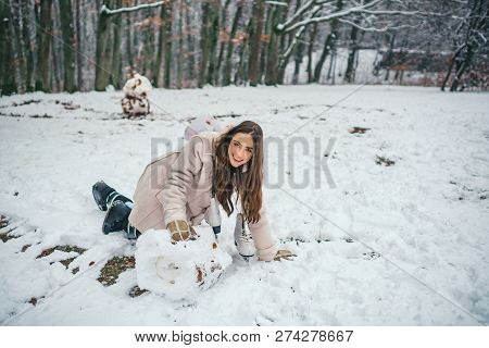 Sensual Brunette Winter Girl Posing And Having Fun. Beautiful Young Woman Laughing Outdoors