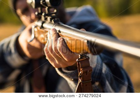 Hunter With Shotgun Gun On Hunt. Barrel Of A Gun. Track Down. Hunting Gear - Hunting Supplies And Eq
