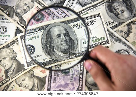 Dollar With Magnifier. Magnifying Glass And Money. Business Conc
