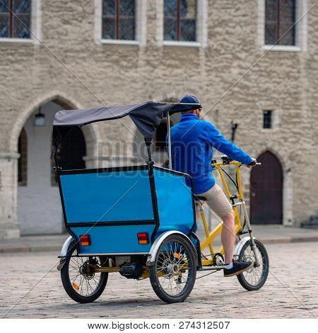 Tricycle Taxi For Tourists On City Center Street