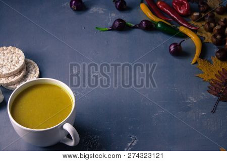 Pumpkin Asian Coconat Cream Soup. Autumn Hot Food. Chili Pepper, Garlic, Red Onion, Big Pumpkin. Dar