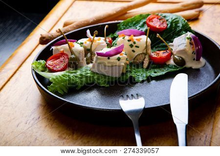 Delicious Restaurant Dish Vitello Tonato In Restaurant Background. Healthy Exclusive Food On Big Bla