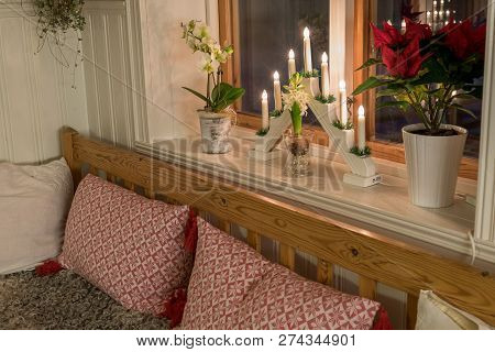 Christmas Decorations In A Sofa And Window