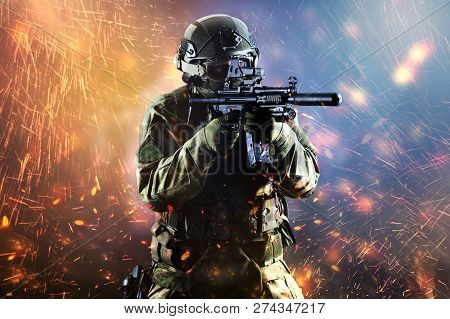 Fighter Of A Special Unit Is Aiming At The Sight Of The Machine Gun. Mixed Media