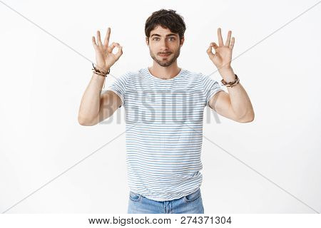 Portrait Of Confident And Skillful Good-looking Male Coworker With Blue Eyes And Beard Wearing Strip