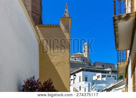 Balearic Islands, Elvissa (ibiza) Traitional Houses With The Cathedral In The Background