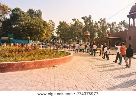 Wagha Border, Amritsar, Punjab, India - June, 2017. People Going To Attend Lowering Of Flags Ceremon