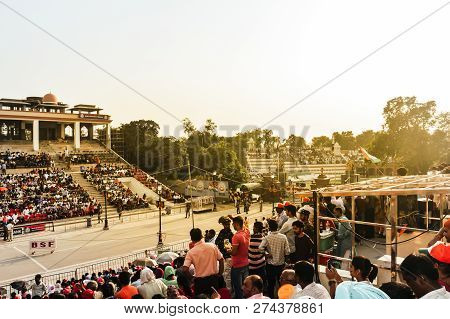 Wagha Border, Amritsar, Punjab, India - June, 2017. People Enjoying The Lowering Of Flags Ceremony. 