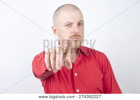 Bearded Man In Red Shirt Pointing Finger Forward