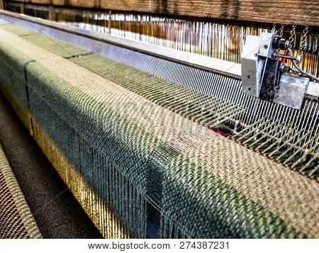 Concept Of Weaving Traditional Tweed Products In Scotland