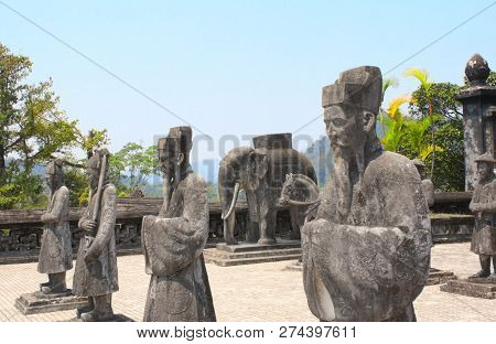 Stone statues of horse, elephant and people in Imperial Minh Mang Tomb of the Nguygen dynasty in Hue, Vietnam. UNESCO world heritage site