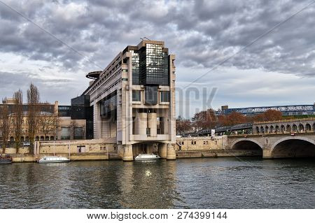 Paris, France - December 05, 2018: French Ministry Of Finance In Bercy With Aerial Metro In Backgrou