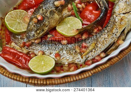 Baked Grey Mullet , Middle Eastern Cuisine Levant, Traditional Assorted Dishes, Top View