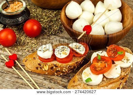 Traditional Italian Mozzarella Cheese On A Wooden Board. Healthy Cheese. Dairy Products. Mozzarella 