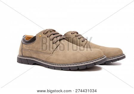Brown suade shoes isolated on white background