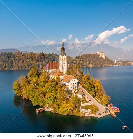 Bled Island On Lake Bled, And Bled Castle And Mountains In Background, Slovenia.