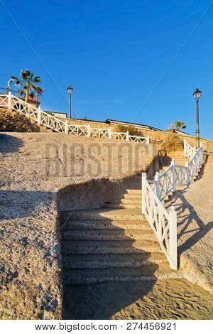 Steps on the beach in the rock. El Duke beach. Tenerife. canary islands, spain