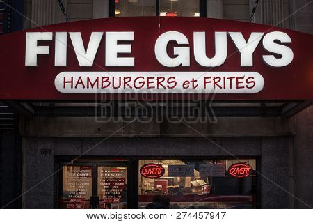 Montreal, Canada - November 5, 2018: Five Guys Logo On Their Main Fast Food Restaurant For Montreal,