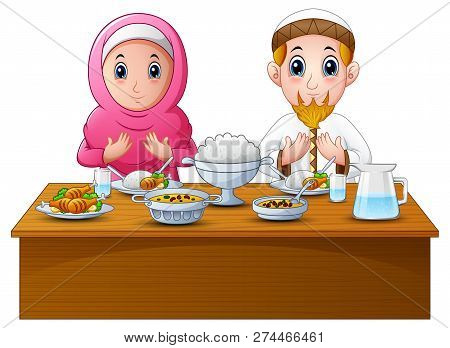 Muslim Couple Pray Together Before Break Fasting