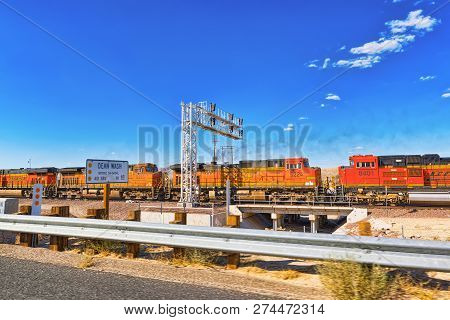 Freight Train Bnsf Railway Companies On A Sunny Day In Arizona.