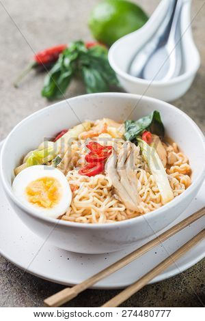 Japanese Ramen Noodle With Chicken, Shiitake Mushroms And Egg In White Bowl