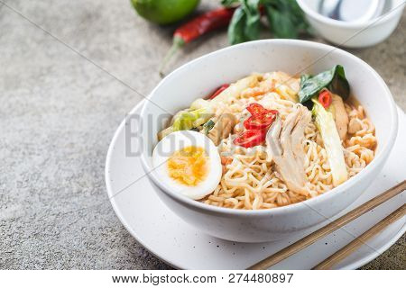 Japanese Ramen Noodle With Chicken, Shiitake Mushroms And Egg In White Bowl