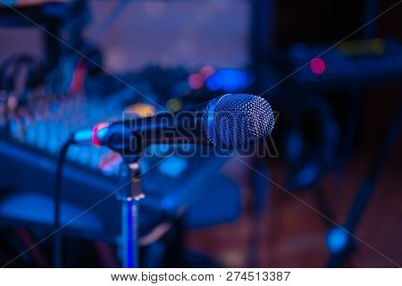 Microphone On Stage. Microphone Close-up. A Pub. Bar. A Restaurant. Music. Evening. Night Show.