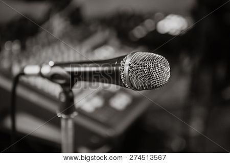 Microphone. Black And White Photo. Microphone On Stage. Microphone Close-up.