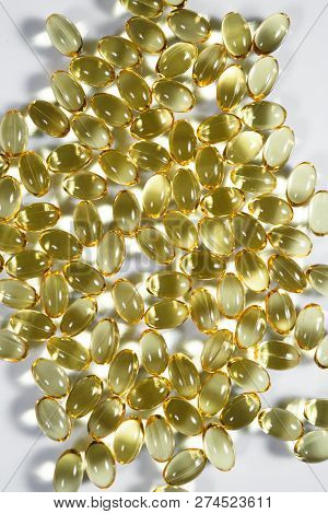 Fish Oil Supplement Capsules Isolated On White Background