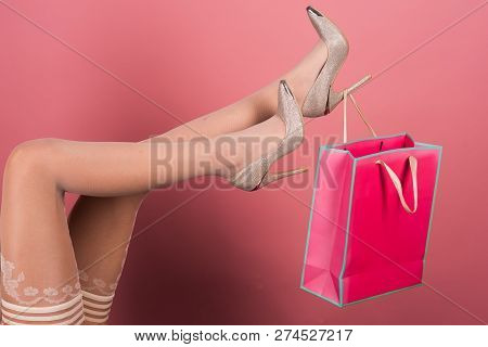 Sexy Gift. Christmas Gift From A Lingerie Store Or Sex Shop. Seductive Stockings. Sensual Female Leg