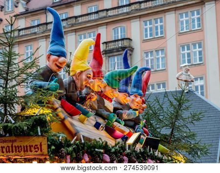 Dresden, Germany - December 14, 2018: View Of The Christmas Decorations, Toys And Scenery Houses On 