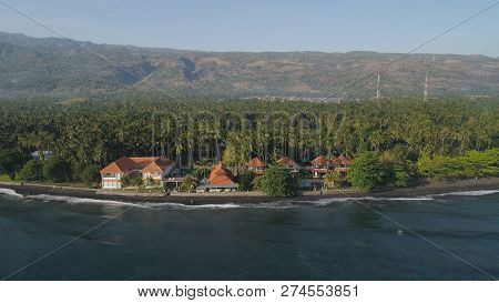Aerial Seascape Luxury Hotel On Beach Background Mountainss In Tropical Resort. Bali, Indonesia, Tra