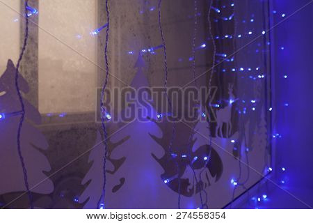 The Contour Of The Winter Forest Is Painted On The Glass With Washable Paints. Scenery Window For Th