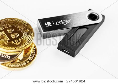 UKRAINE, ROVNO - ON DECEMBER 2: Ledger hardware wallet for cryptocurrency on a white background