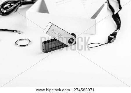 UKRAINE, ROVNO - ON DECEMBER 2: Ledger hardware wallet for cryptocurrency on a white background