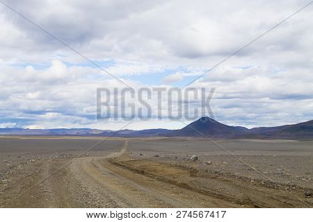 Dirt Road Along Central Highlands Of Iceland. Iceland Landscape. Route F907