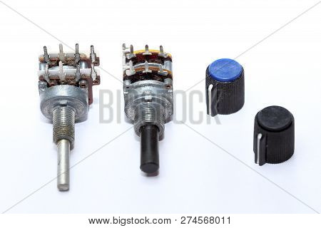 Two Potentiometer With Different Knobs On Isolated Background