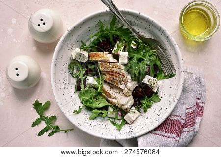 Beetroot Salad With Arugula, Grilled Chicken Fillet And Feta Cheese.top View With Copy Space.