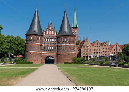 Luebeck, Germany - June 7, 2018: Historic Holsten Gate, Landmark Of The Hanseatic City Of Lübeck On 