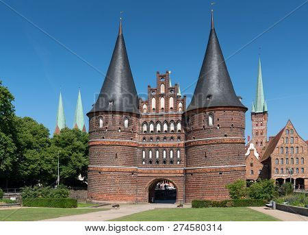 Luebeck, Germany - June 7, 2018: Historic Holsten Gate, Landmark Of The Hanseatic City Of Lübeck On 