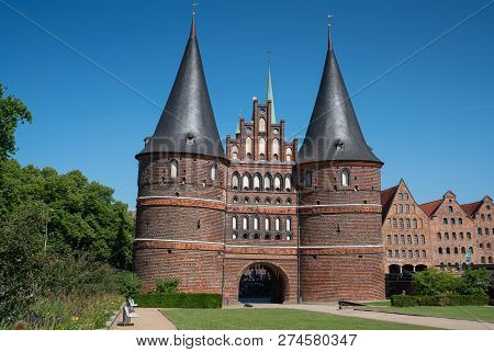 Luebeck, Germany - June 7, 2018: Historic Holsten Gate, Landmark Of The Hanseatic City Of Lübeck On 