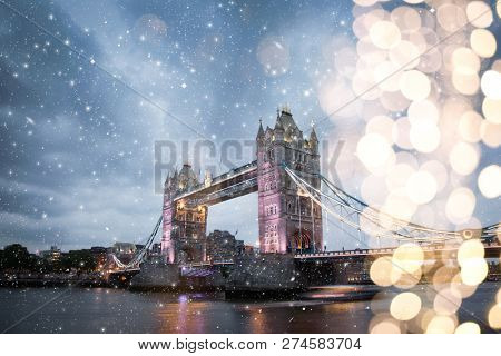 snowing in London, UK - winterholidays  in the city