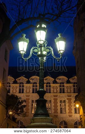 The Lamp Post On Place De Furstenberg At Night, Paris, France.