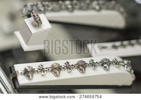 Silver Bracelet With Skulls On The Wind. Selected Focus