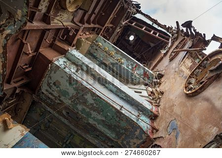 Internal Parts Of Decommissioned Marine Ship That Was Cut And Left On The Shore.