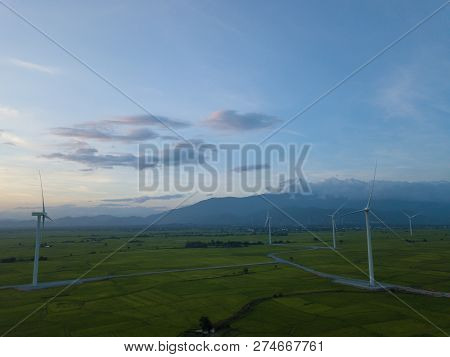 Wind Turbines Farm Or Windmill On A Summer Day. High-quality Stock Photo Image Wind Turbine Or Windm