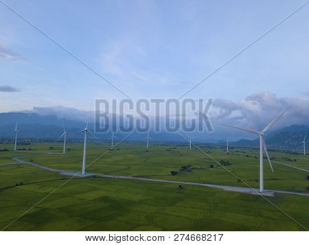 Wind Turbines Farm Or Windmill On A Summer Day. High-quality Stock Photo Image Wind Turbine Or Windm